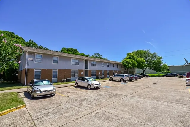 a car parked in front of a house