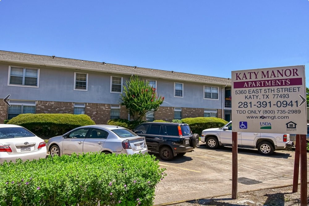 5360 East 5th Street Katy, TX 77493 - Photo 5 of 11 a car parked in front of a house