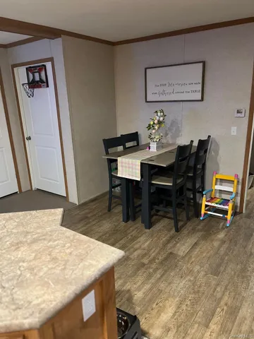 a view of a workspace with furniture