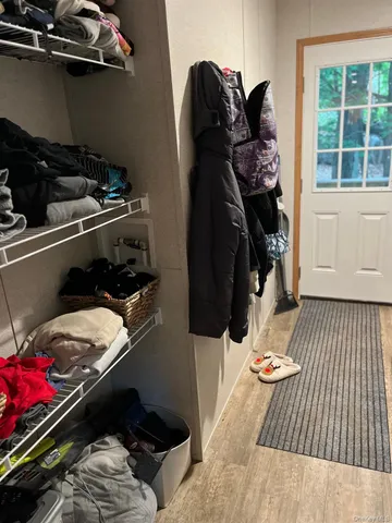 a bed room with a bed and a window