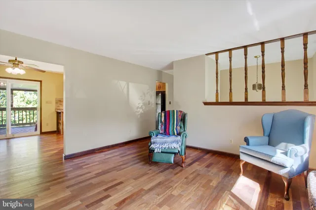 a room with furniture and wooden floor