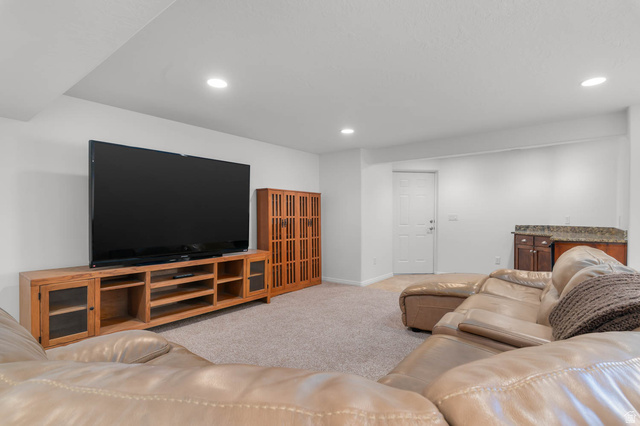 439 East 13540 South Draper, UT 84020 - Photo 25 of 46 Spacious recreation room featuring recessed lighting and wall-to-wall carpeting