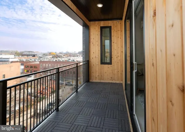 a view of a balcony with city view
