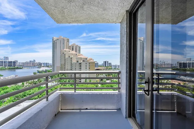 a large kitchen with a large window
