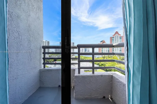 a view of a city with tall buildings