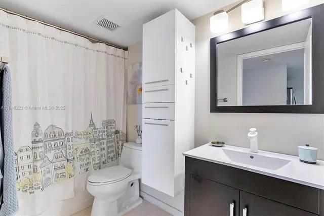 a view of a city with tall buildings