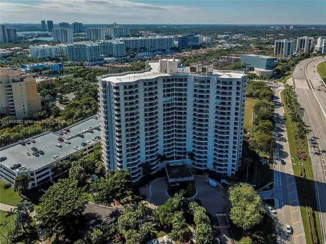 a view of a building with a yard