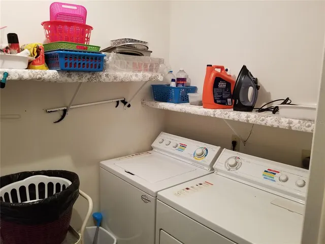 a utility room with dryer and washer
