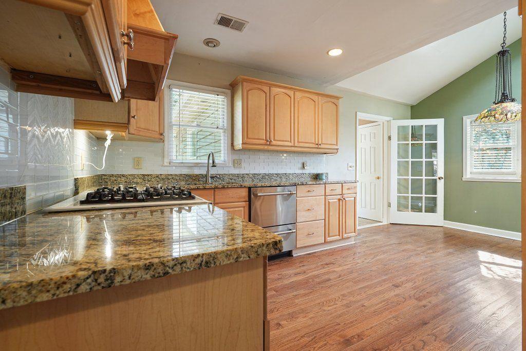 3799 Oglesby Road Powder Springs, GA 30127 - Photo 21 of 39 a kitchen with a stove a sink and a microwave