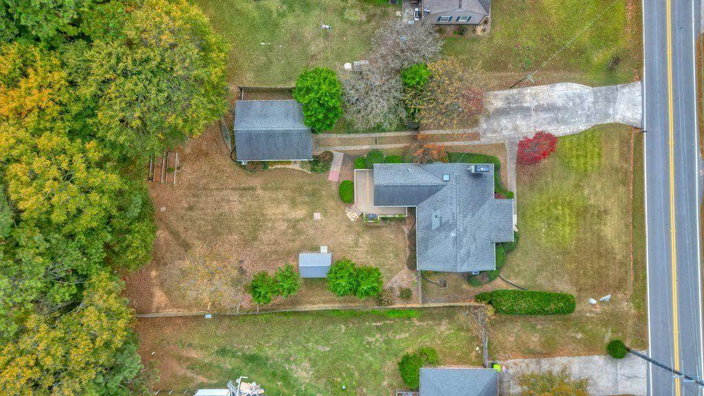 3799 Oglesby Road Powder Springs, GA 30127 - Photo 32 of 39 an aerial view of residential house with outdoor space