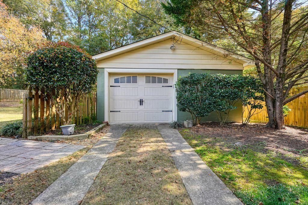 3799 Oglesby Road Powder Springs, GA 30127 - Photo 36 of 39 a view of a house with a yard