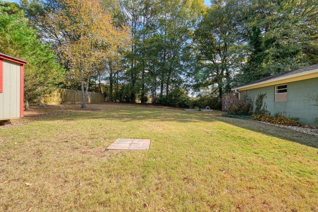 3799 Oglesby Road Powder Springs, GA 30127 - Photo 39 of 39 a view of a swimming pool with an outdoor space
