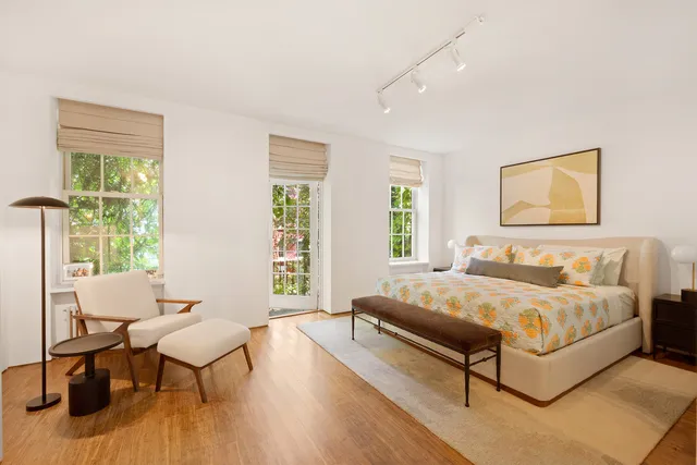 a spacious bathroom with a tub and shower