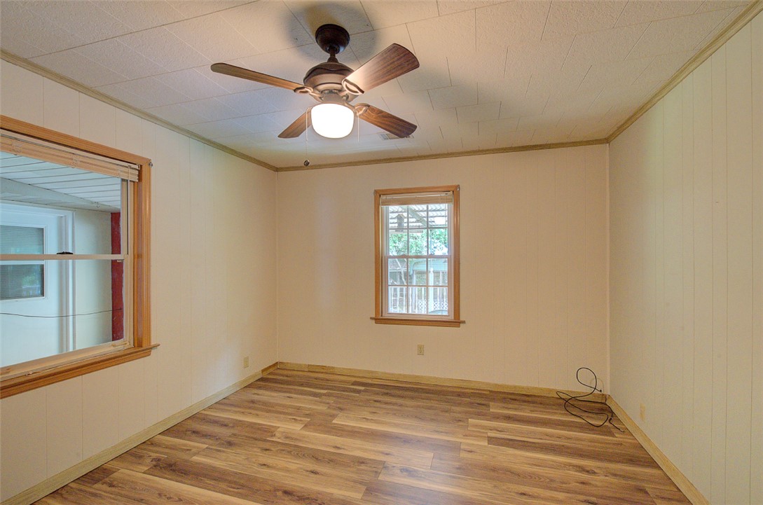 5064 Keowee School Road Seneca, SC 29672 - Photo 24 of 49 This versatile space features durable flooring and a refreshing ceiling fan.