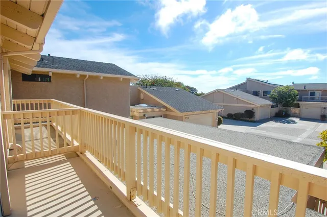 a view of balcony with furniture