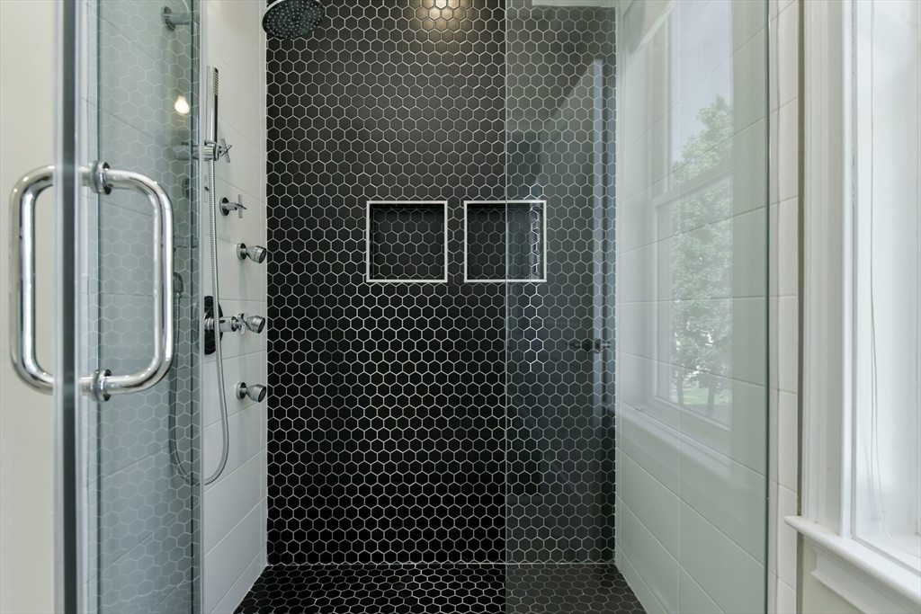 884 Adams Street, Unit 3 Boston, MA 02124 - Photo 15 of 24 a bathroom with a shower