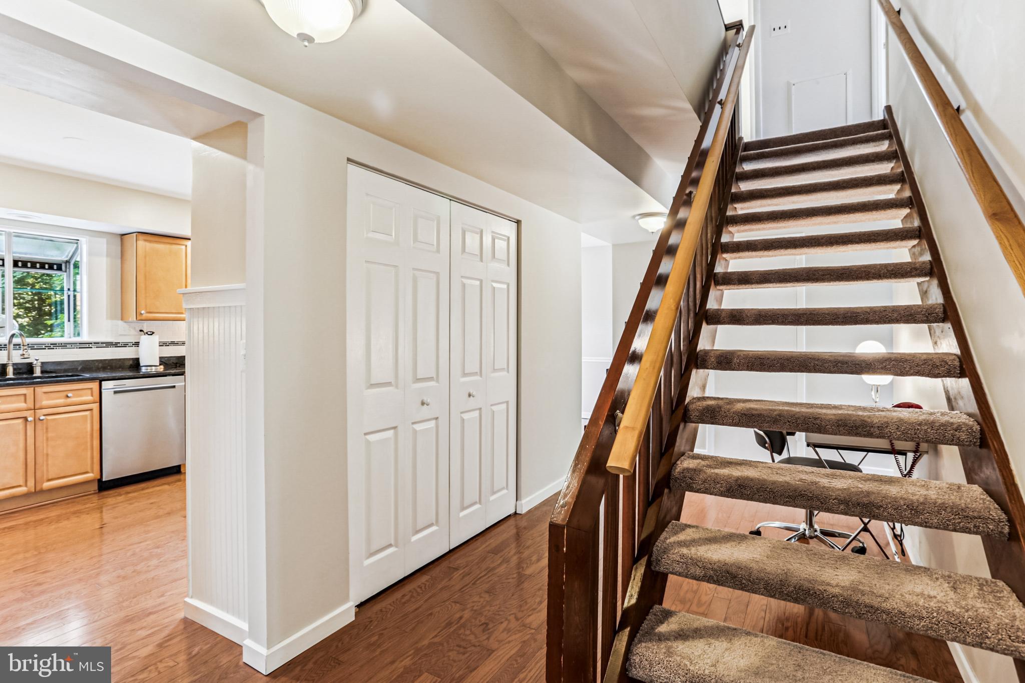 9013 2nd Avenue Silver Spring, MD 20910 - Photo 26 of 56 a view of an entryway with wooden floor and staircase