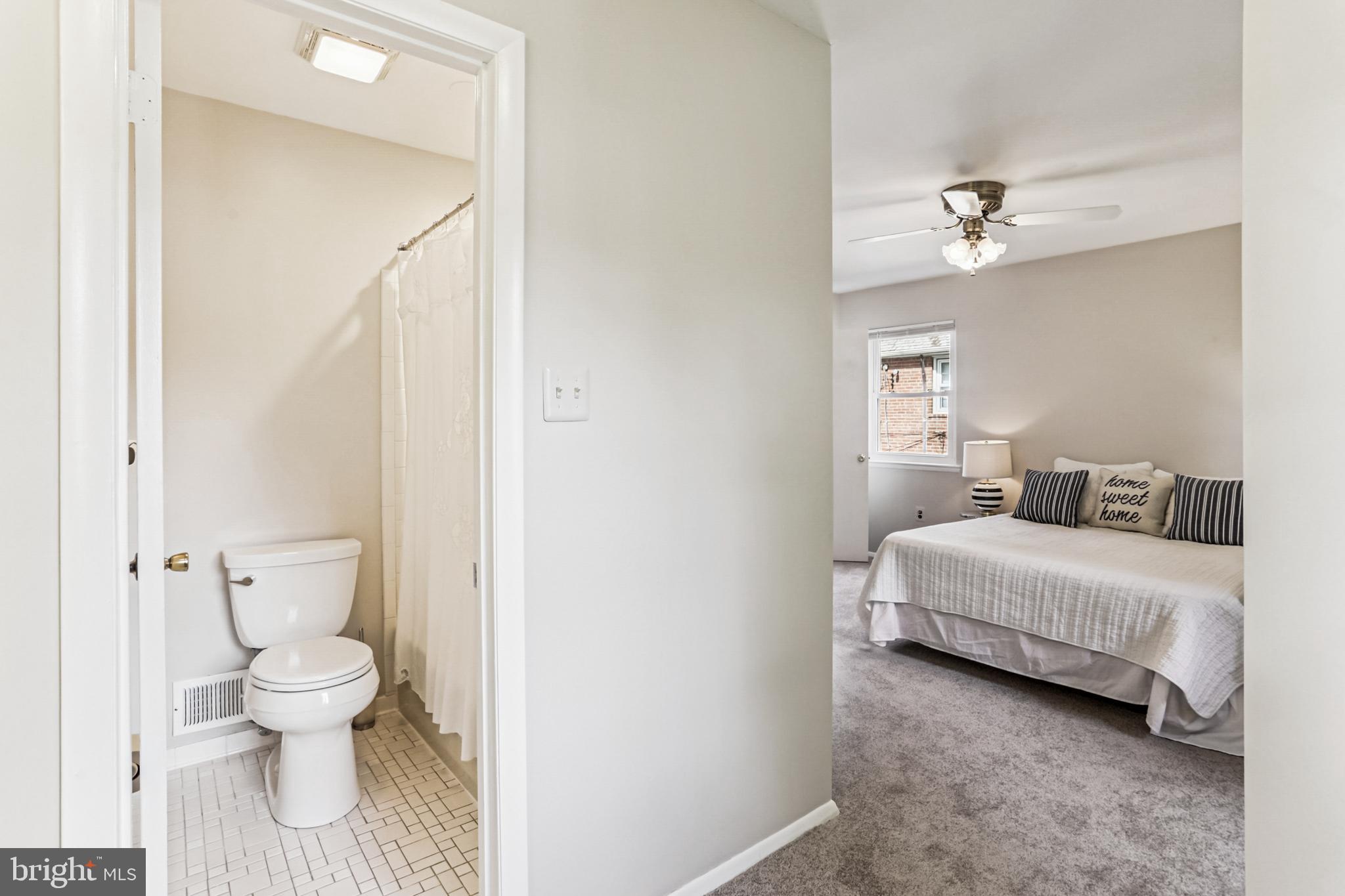 9013 2nd Avenue Silver Spring, MD 20910 - Photo 32 of 56 a bathroom with a toilet sink and shower