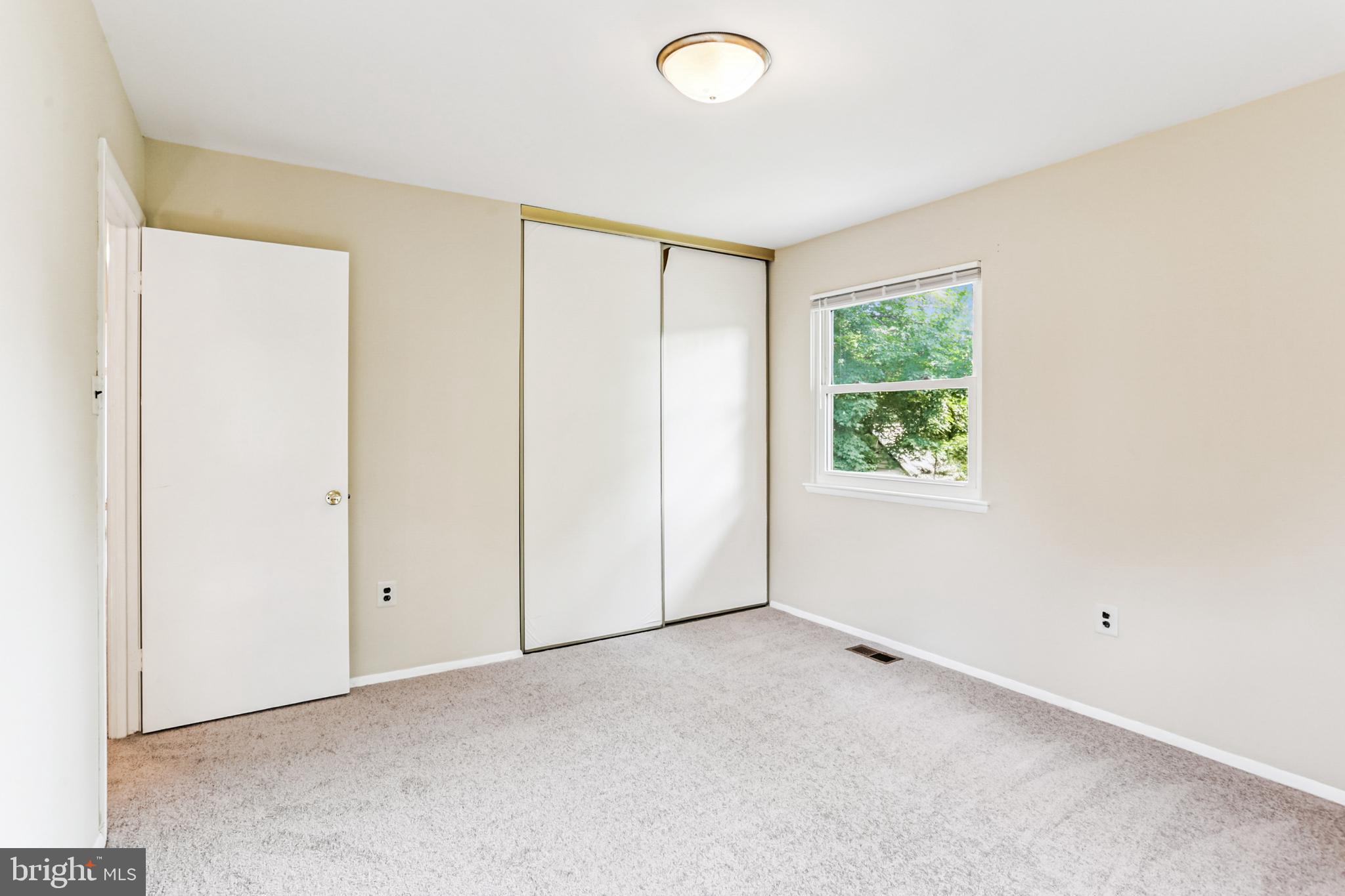 9013 2nd Avenue Silver Spring, MD 20910 - Photo 38 of 56 an empty room with windows and closet