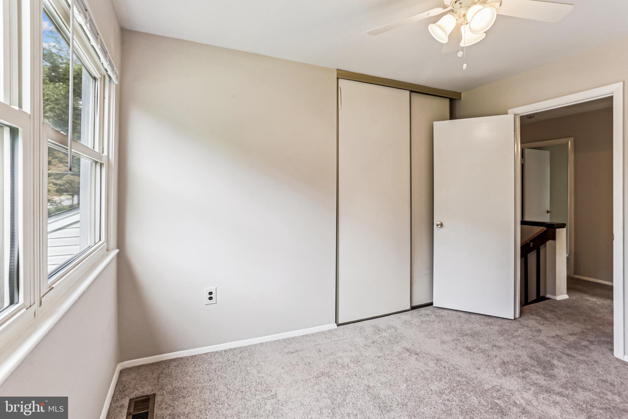 9013 2nd Avenue Silver Spring, MD 20910 - Photo 42 of 56 a view of an empty room with a chandelier