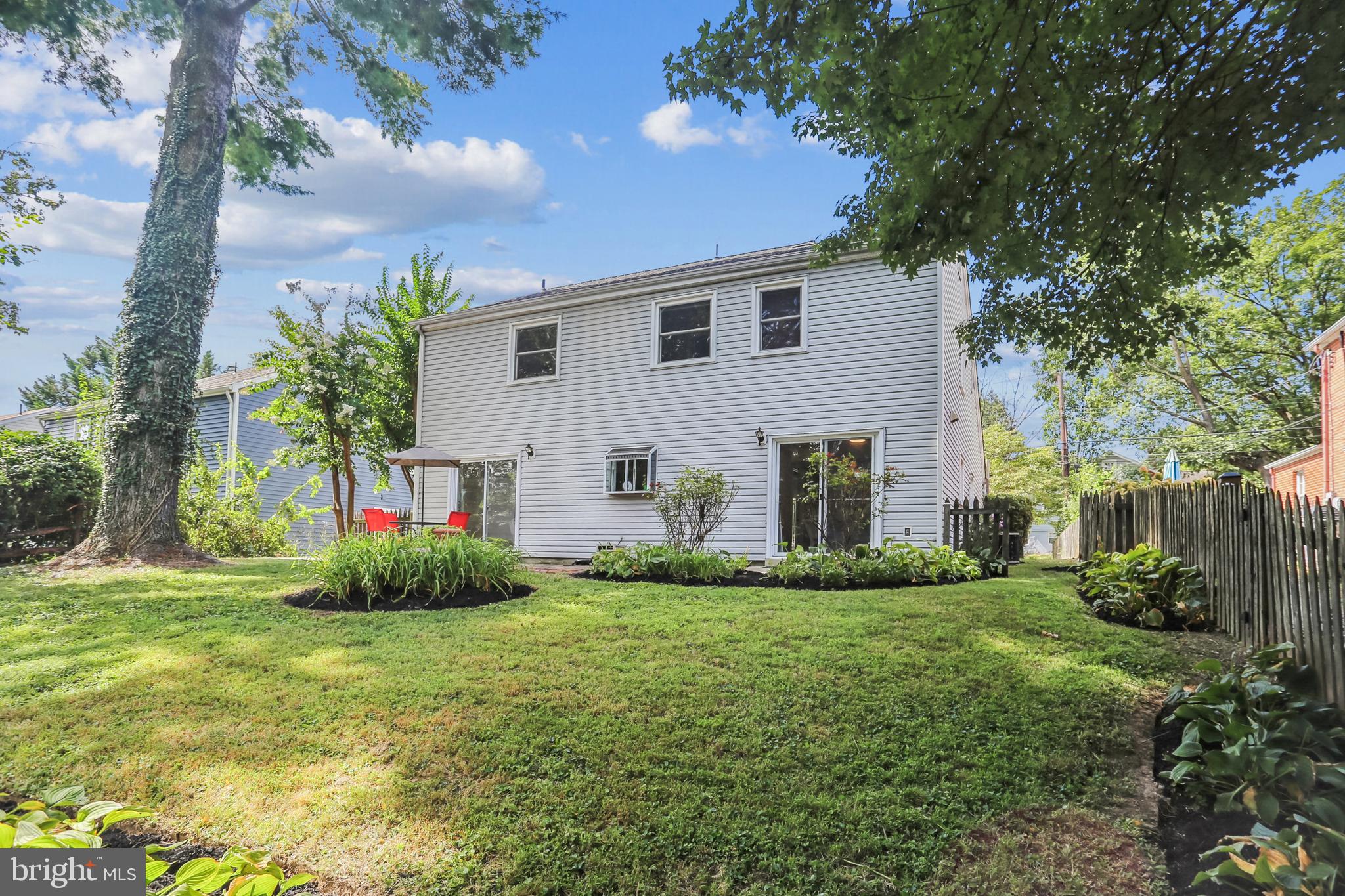 9013 2nd Avenue Silver Spring, MD 20910 - Photo 51 of 56 a view of a house with garden and trees