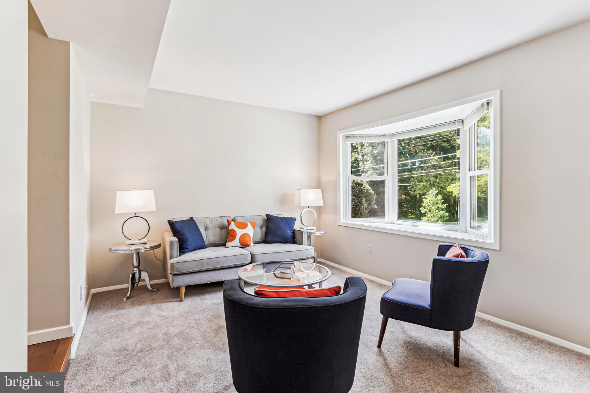 9013 2nd Avenue Silver Spring, MD 20910 - Photo 9 of 56 a living room with furniture and a window