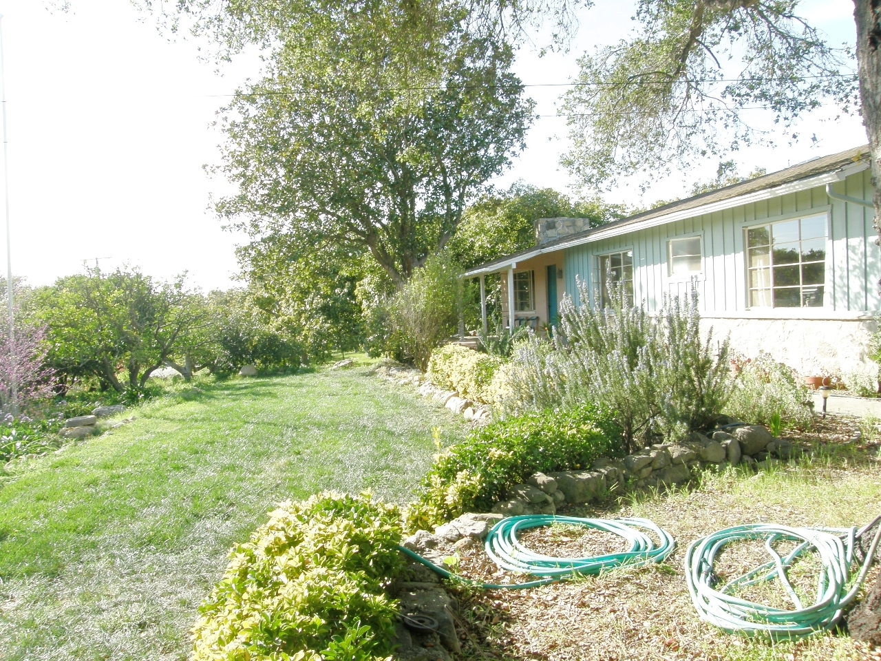 2222 Feather Hill Road Santa Barbara, CA 93108 - Photo 11 of 18 a view of a chair and table in backyard