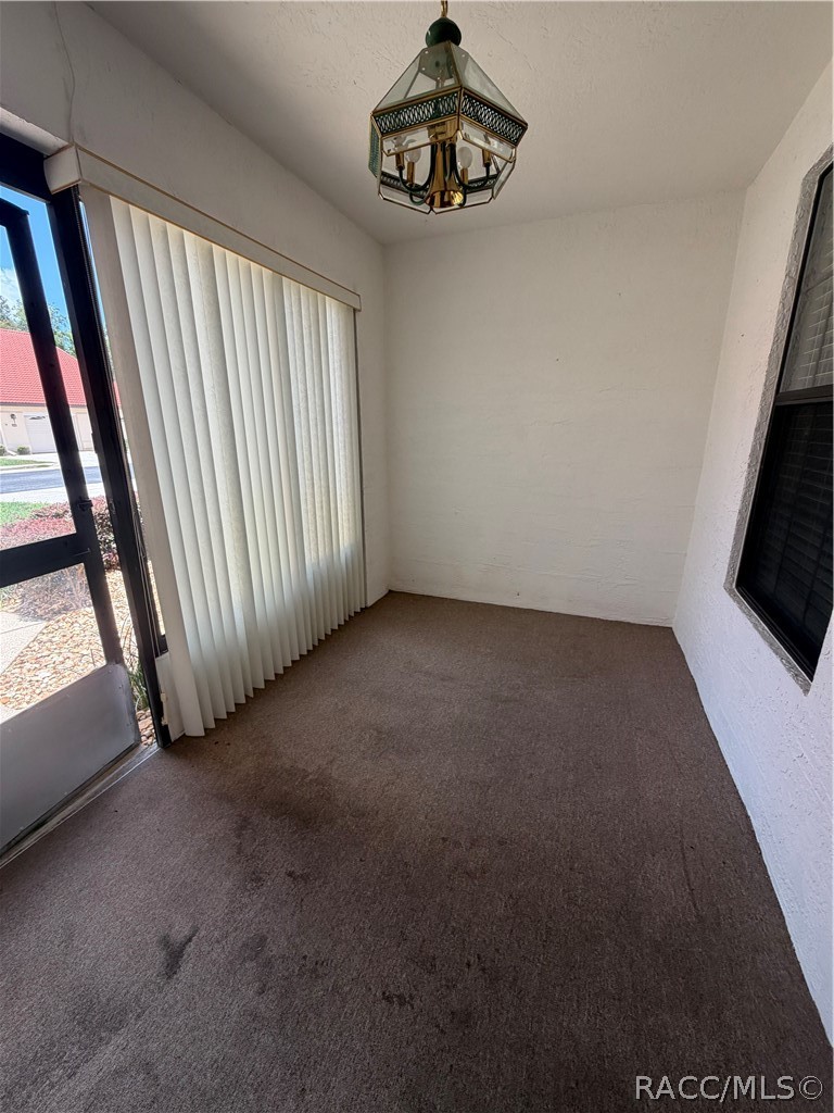 2080 Forest Drive Inverness, FL 34453 - Photo 15 of 37 Front enclosed porch