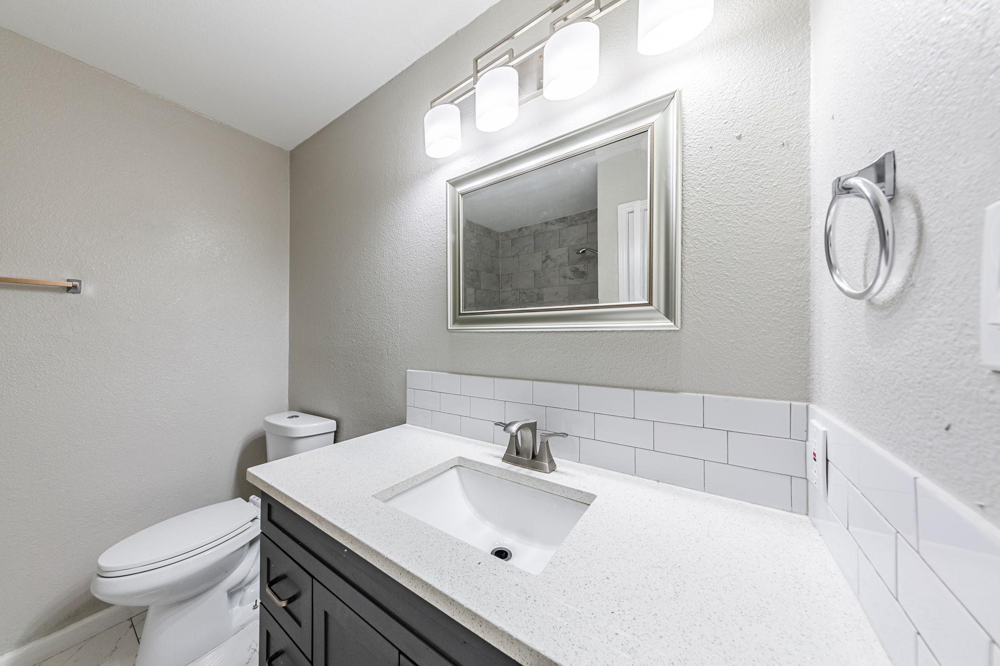 2011 East Stassney Lane, Unit A Austin, TX 78744 - Photo 14 of 23 a bathroom with a sink toilet and vanity