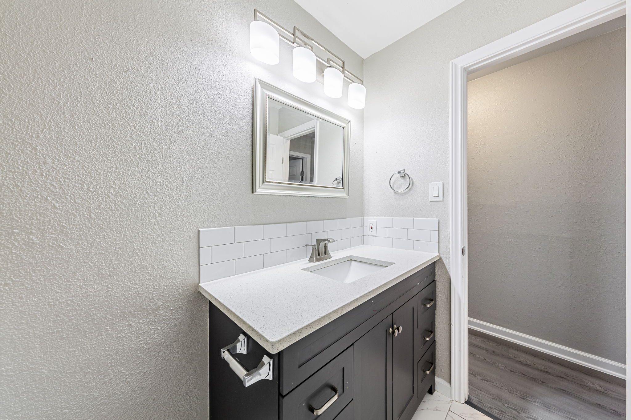2011 East Stassney Lane, Unit A Austin, TX 78744 - Photo 16 of 23 a bathroom with a sink and a mirror