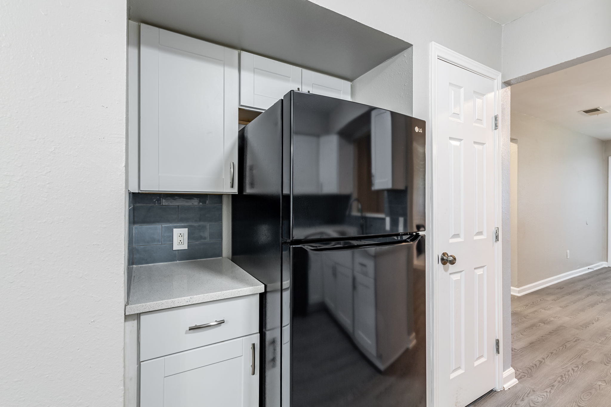 2011 East Stassney Lane, Unit A Austin, TX 78744 - Photo 9 of 23 a kitchen with a refrigerator and a stove