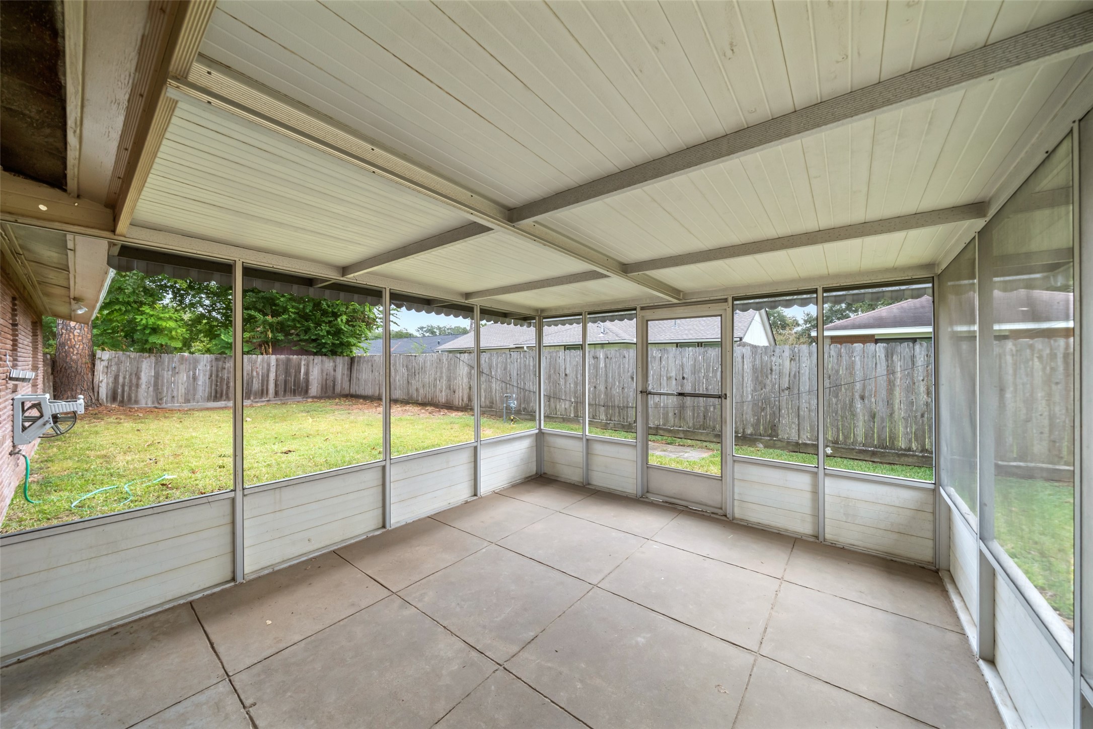 9779 Westview Drive Houston, TX 77055 - Photo 25 of 27 a view of an empty room with sliding door