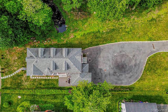 1 Kewanee Road New Rochelle, NY 10804 - Photo 34 of 36 an aerial view of a house with a yard