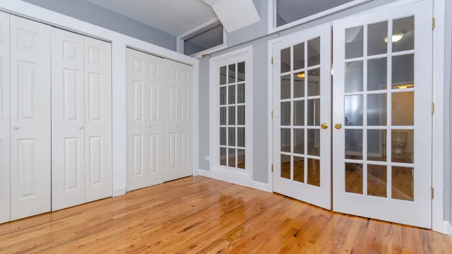 a view of empty room with windows