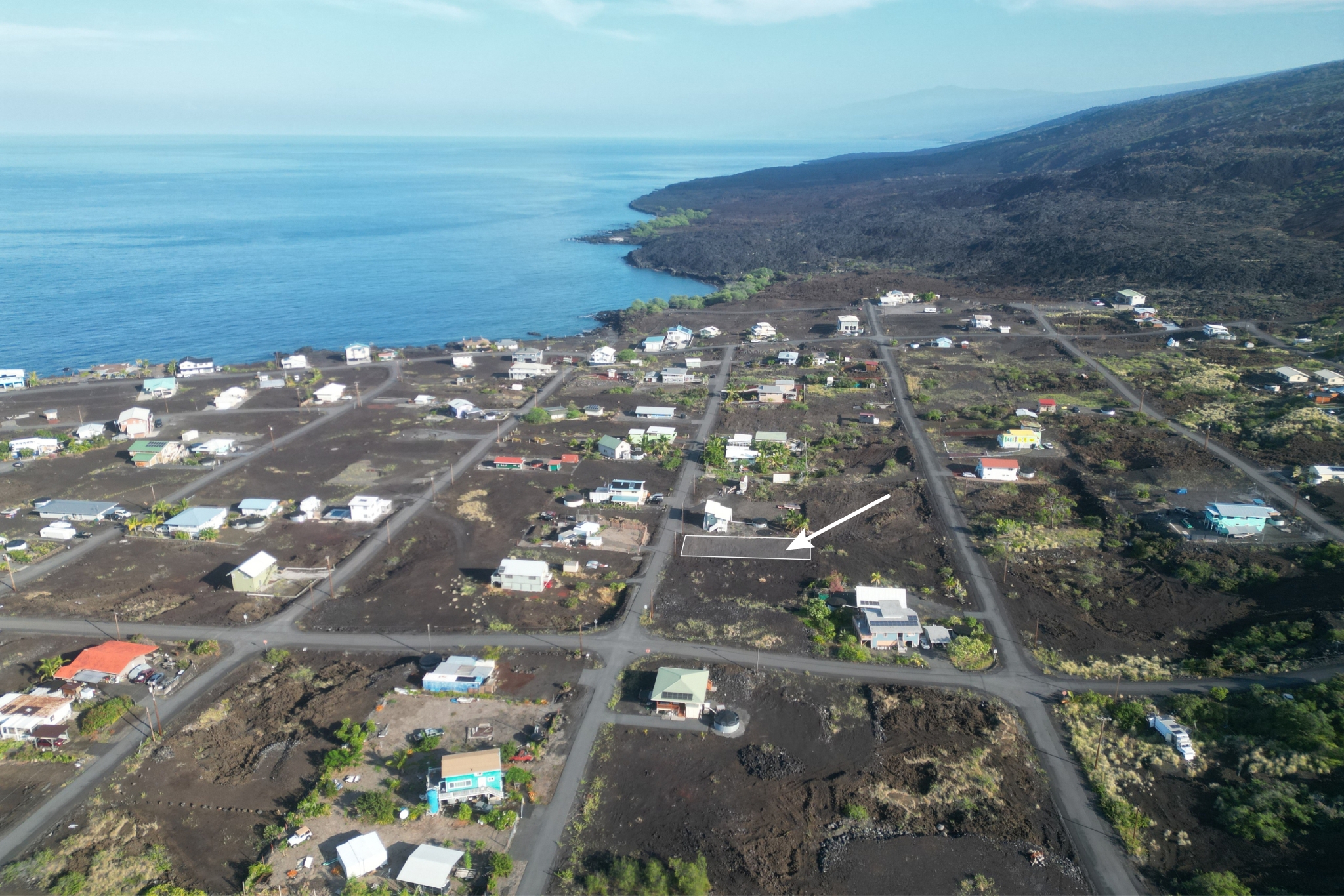 88-1546 Ehiku Avenue Captain Cook, HI 96704 - Photo 2 of 14 a city view with lot of flower space
