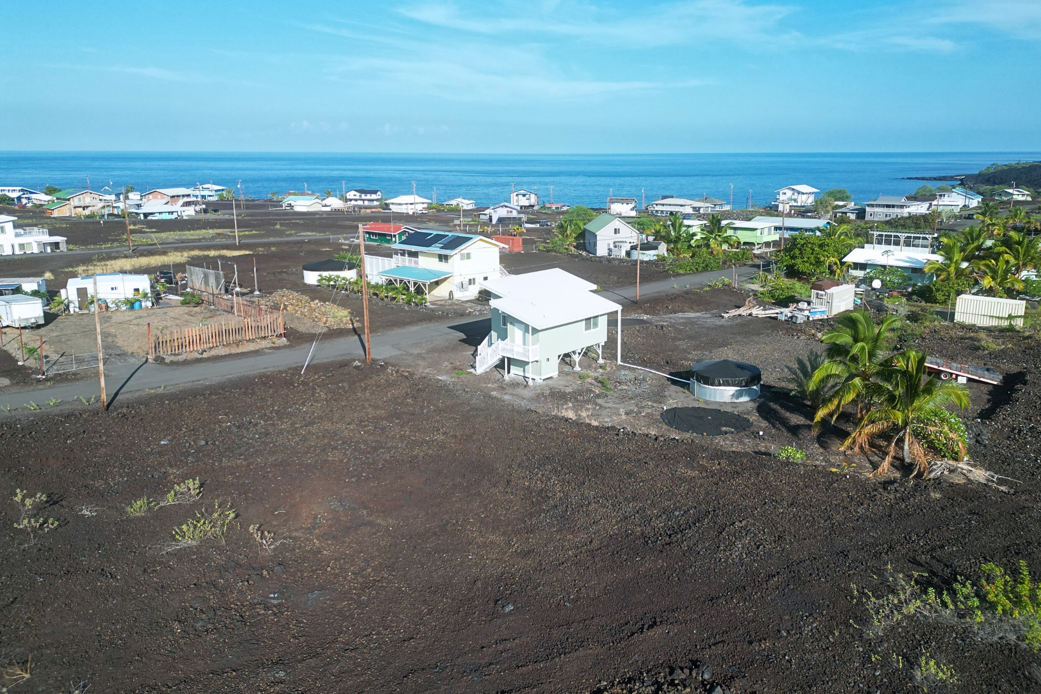 88-1546 Ehiku Avenue Captain Cook, HI 96704 - Photo 7 of 14 a view of a terrace with lawn chairs