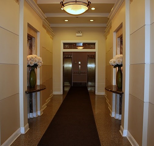 807 Church Street, Unit 407 Evanston, IL 60201 - Photo 2 of 9 a view of a hallway with closet and wooden floor