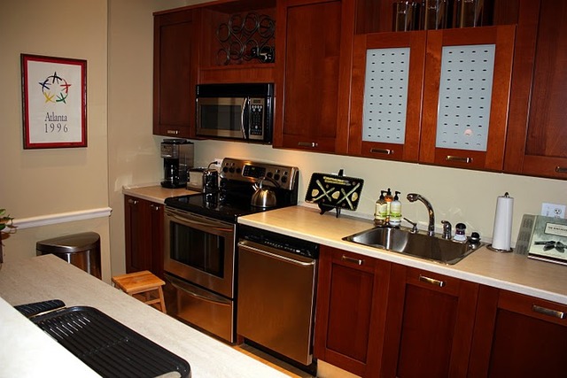 807 Church Street, Unit 407 Evanston, IL 60201 - Photo 5 of 9 a kitchen with granite countertop a sink stove and cabinets