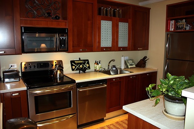 807 Church Street, Unit 407 Evanston, IL 60201 - Photo 7 of 9 a kitchen with stainless steel appliances a stove a microwave a sink and cabinets