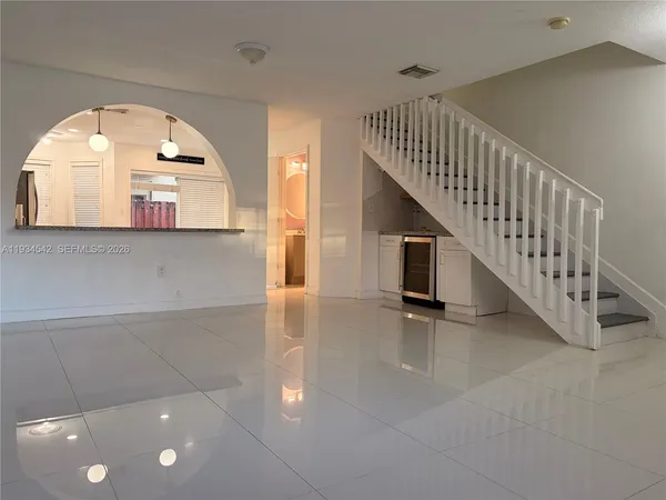 a view of entryway with stairs