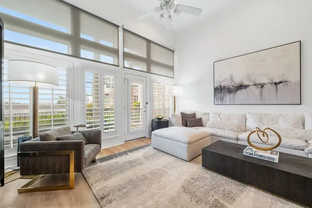 a spacious bedroom with a large bed and a couch