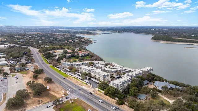 a view of a city and ocean