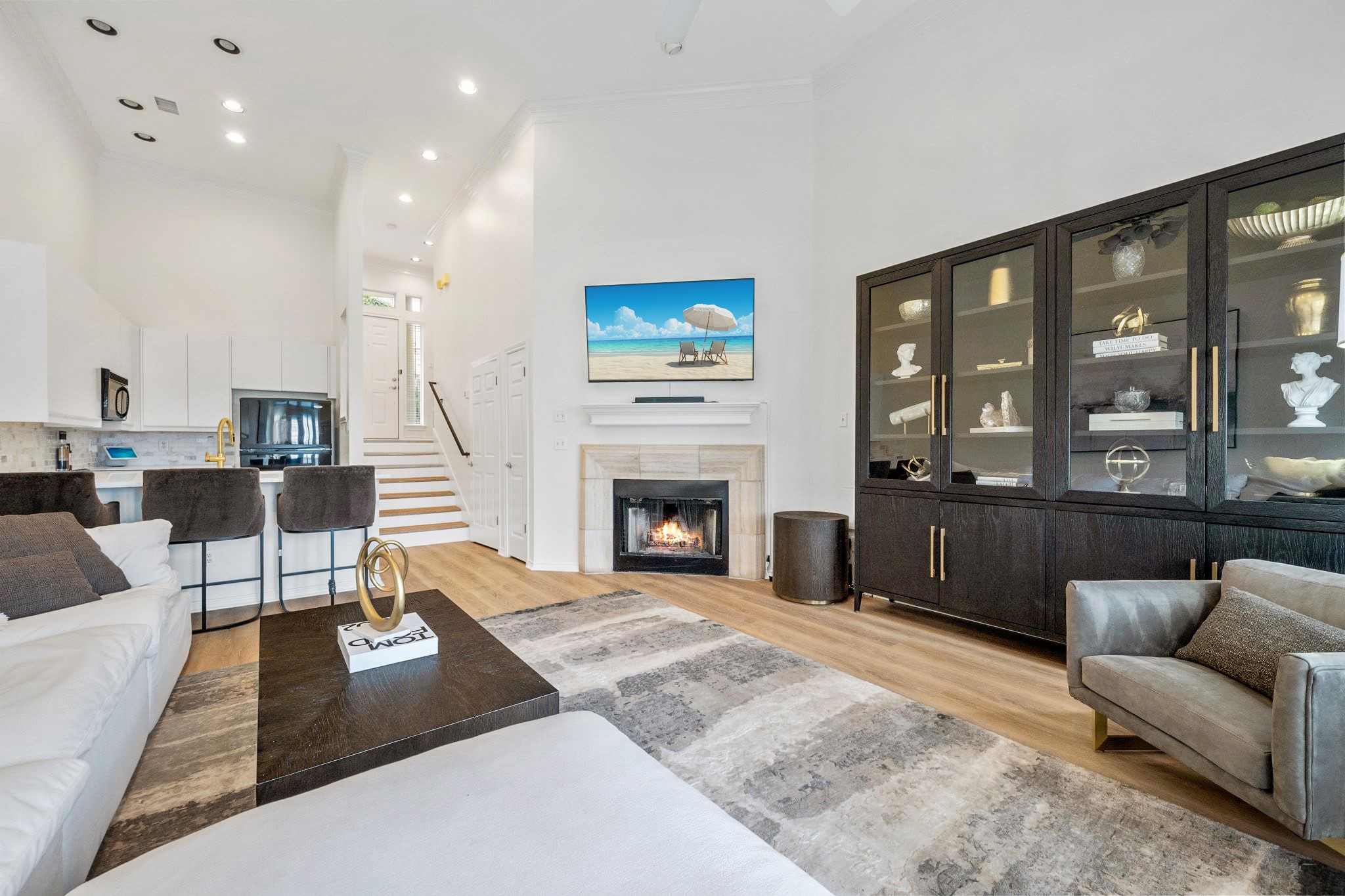 2918 Ranch Road 620, Unit 161 Austin, TX 78734 - Photo 5 of 35 a living room with furniture and a fireplace