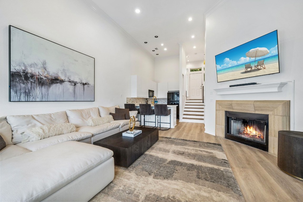 2918 Ranch Road 620, Unit 161 Austin, TX 78734 - Photo 6 of 35 a living room with furniture and a fireplace