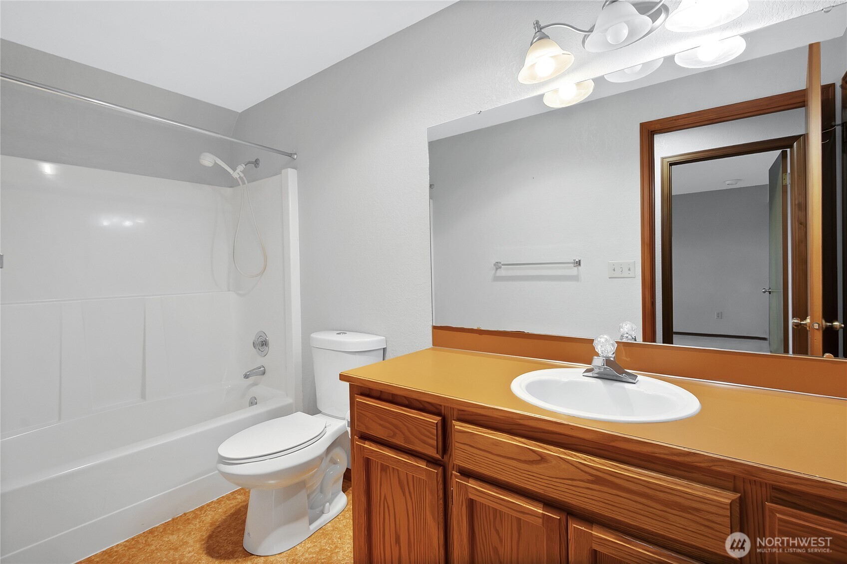 2881 Initial Avenue Enumclaw, WA 98022 - Photo 15 of 25 a bathroom with a sink a toilet and shower