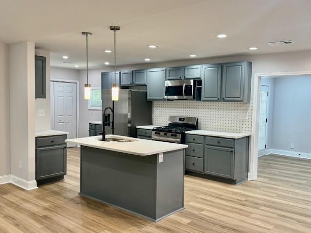 3892 Springleaf Point Stone Mountain, GA 30083 - Photo 1 of 1 a kitchen with stainless steel appliances granite countertop a sink stove and refrigerator