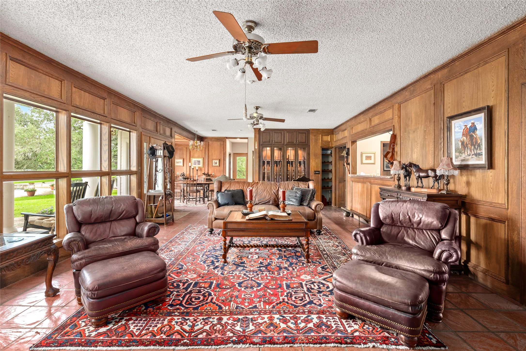 7023 Wolters Road Schulenburg, TX 78956 - Photo 14 of 49 a living room with furniture ceiling fan and a rug
