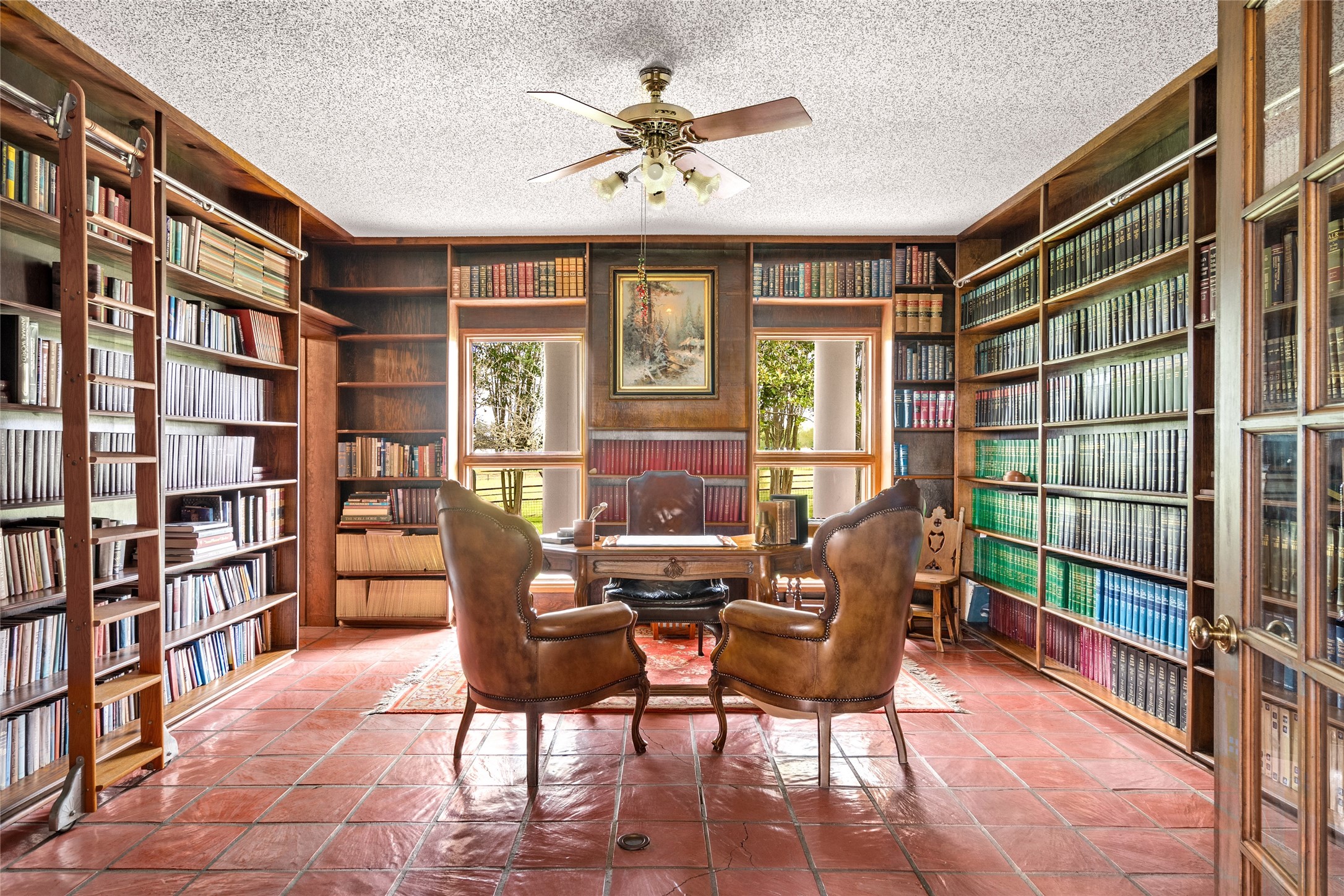7023 Wolters Road Schulenburg, TX 78956 - Photo 15 of 49 a view of a livingroom with furniture and a bookshelf