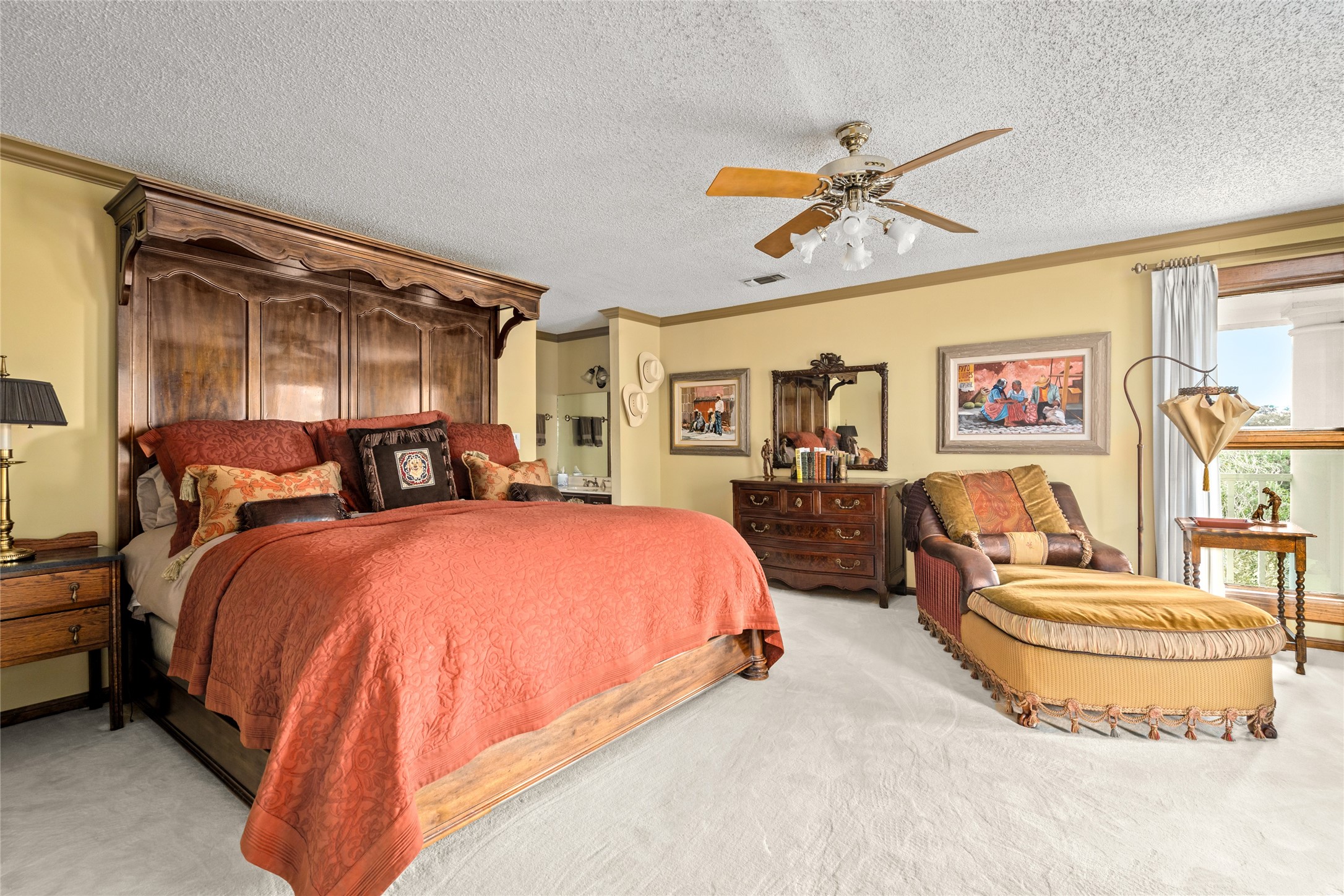 7023 Wolters Road Schulenburg, TX 78956 - Photo 25 of 49 a spacious bedroom with a bed and ceiling fan