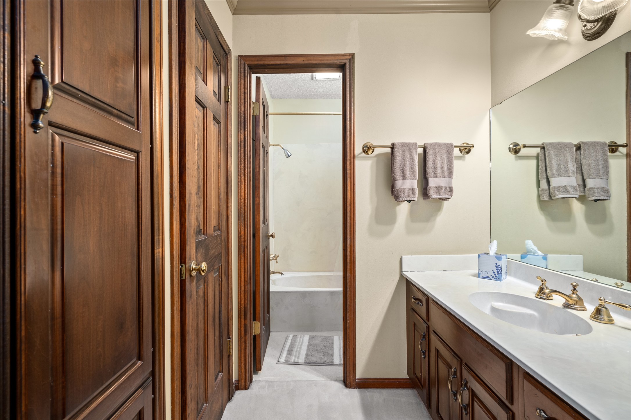 7023 Wolters Road Schulenburg, TX 78956 - Photo 26 of 49 a bathroom with a sink and mirror